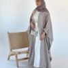 Lexus Ensemble Vollkommenheit abaya, showcasing the light brown exterior, matching shoes, and a silver bag for a cohesive and elegant look.